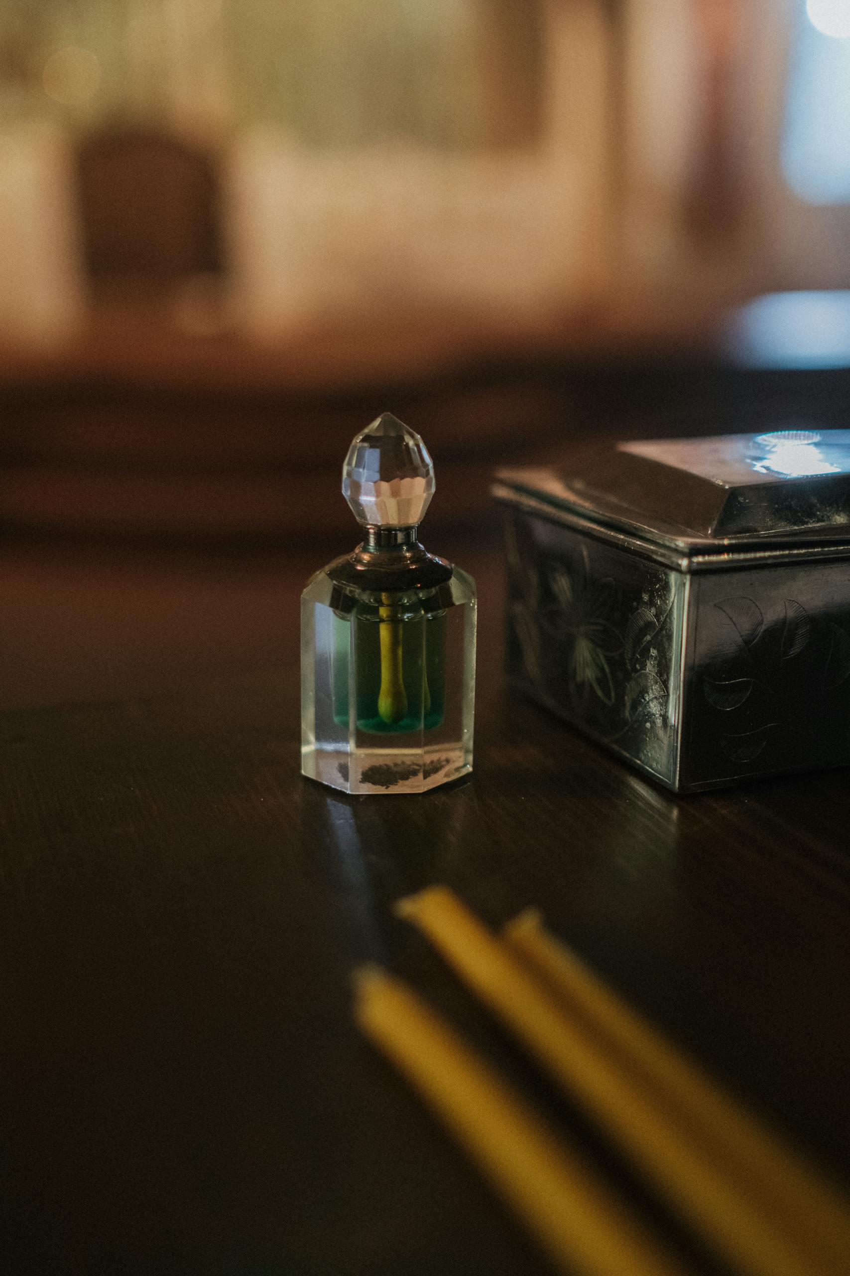 Glass bottle with candles in an Orthodox Church setting, emphasizing spirituality and tradition.